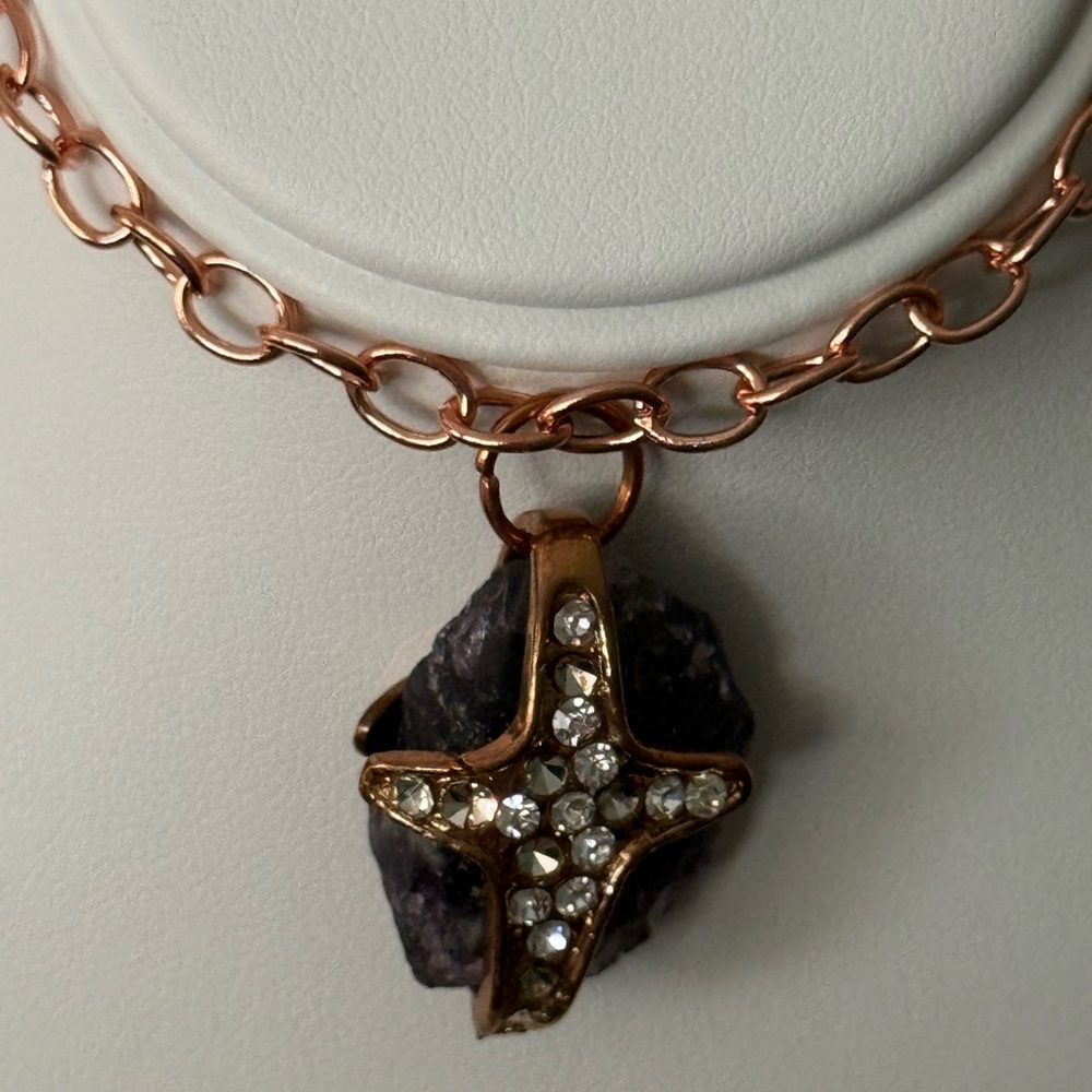 Handcrafted cross bracelet with stone accents